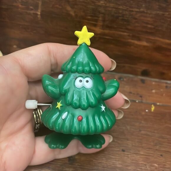 Collection of 4 plastic M & M ornament, wind up toys & top - Picture 9 of 12